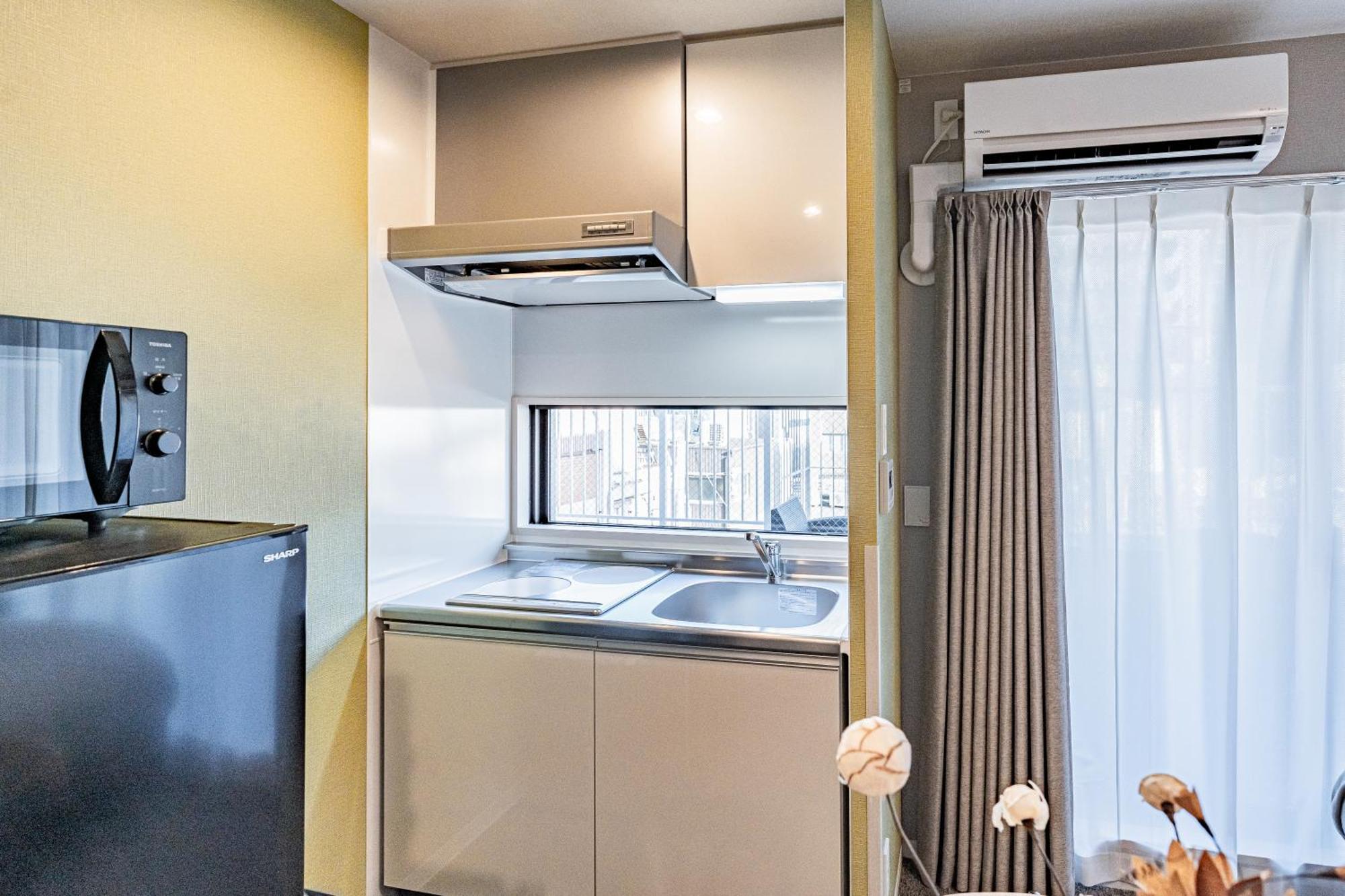 Apartment Hotel 11 Umeda Kamiyama Осака Экстерьер фото