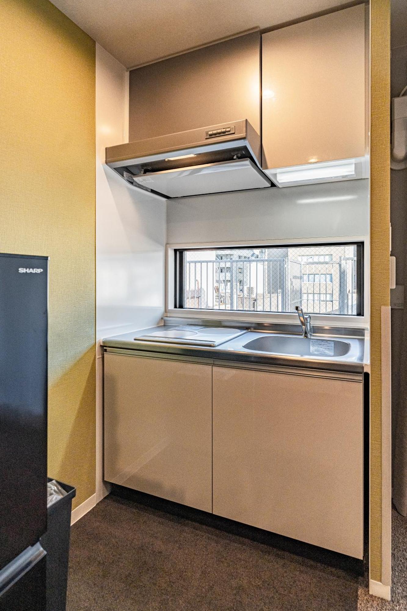 Apartment Hotel 11 Umeda Kamiyama Осака Экстерьер фото